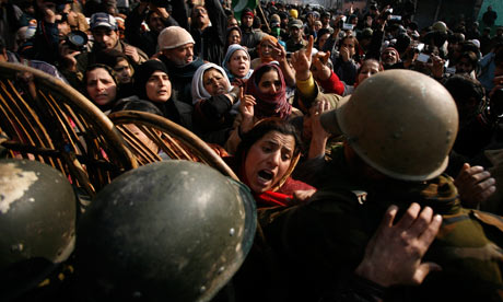 Kashmiri women confront Indian soliders during a protest over the killing of a student in Srinagar. Photograph: Farooq Khan/EPA