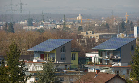 Solar panels stand on the roofs of the Sun Ship part of the Freiburg Solar Settlement in Freiburg im Breisgau.  Photograph: Harold Cunningham/Getty Images
