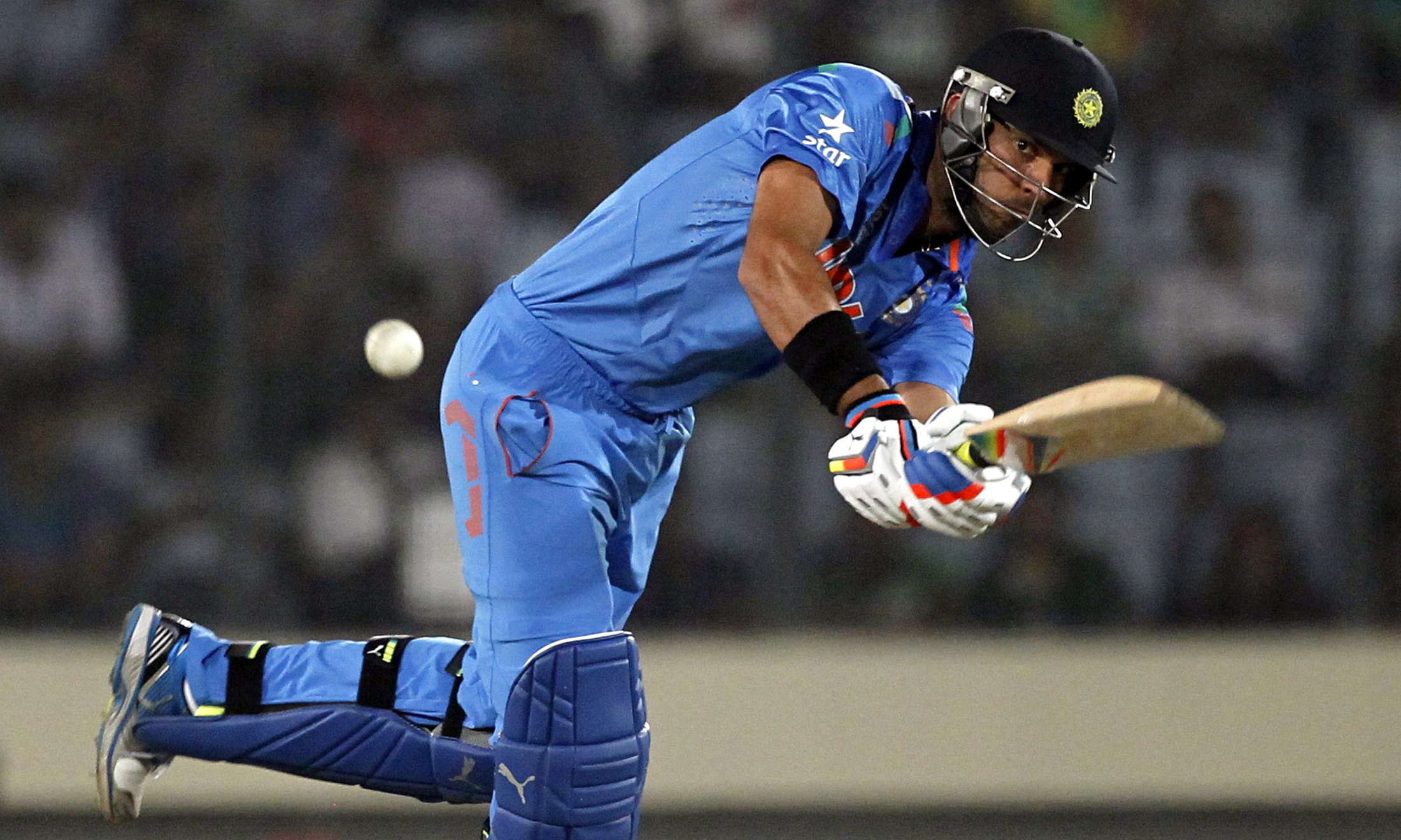 India maintain 100% run at World Twenty20 by thrashing poor Australia