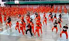 Psy's Gangnam Style performed by Filipino prisoners – video