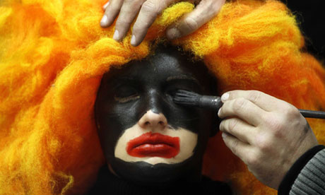 A woman's face is painted to become a Black Pete in Soest in the Netherlands. Photograph: Bas Czerwinski/EPA