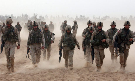 US soldiers return to their barracks at a military base outside Fallujah, Iraq, in 2004. Photograph: Stefan Zaklin/EPA
