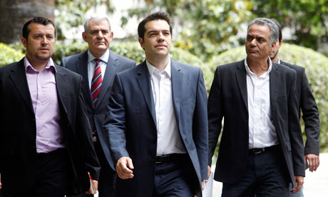 Syriza, led by Alexis Tsipras, centre, 'stands every chance of … forming a coalition government of anti-bailout forces' in Greece. Photograph: Simela Pantzartzi/EPA