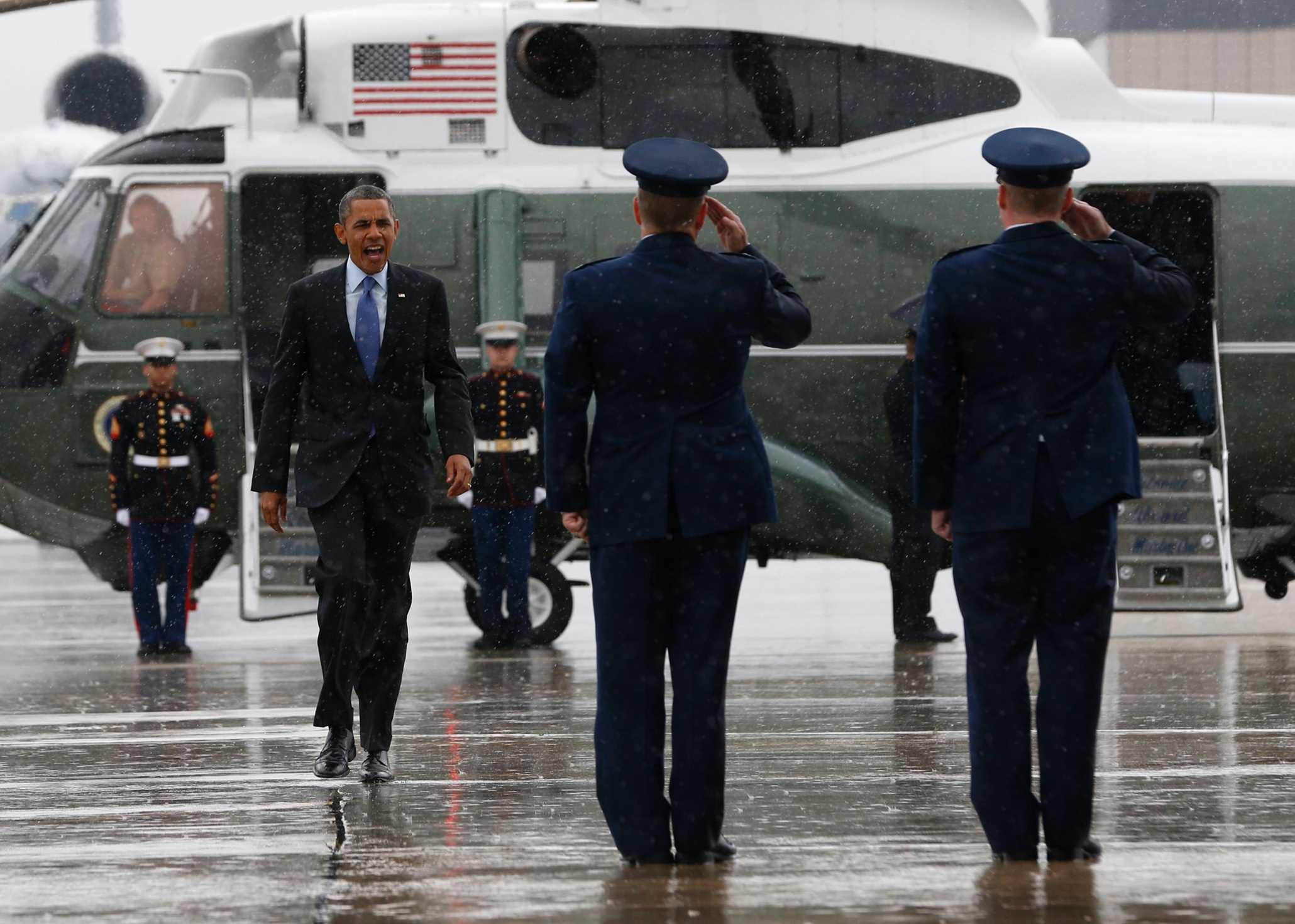 Обама под дождем
