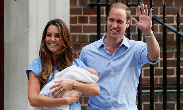 Prince of Cambridge's parents present him to the world at first