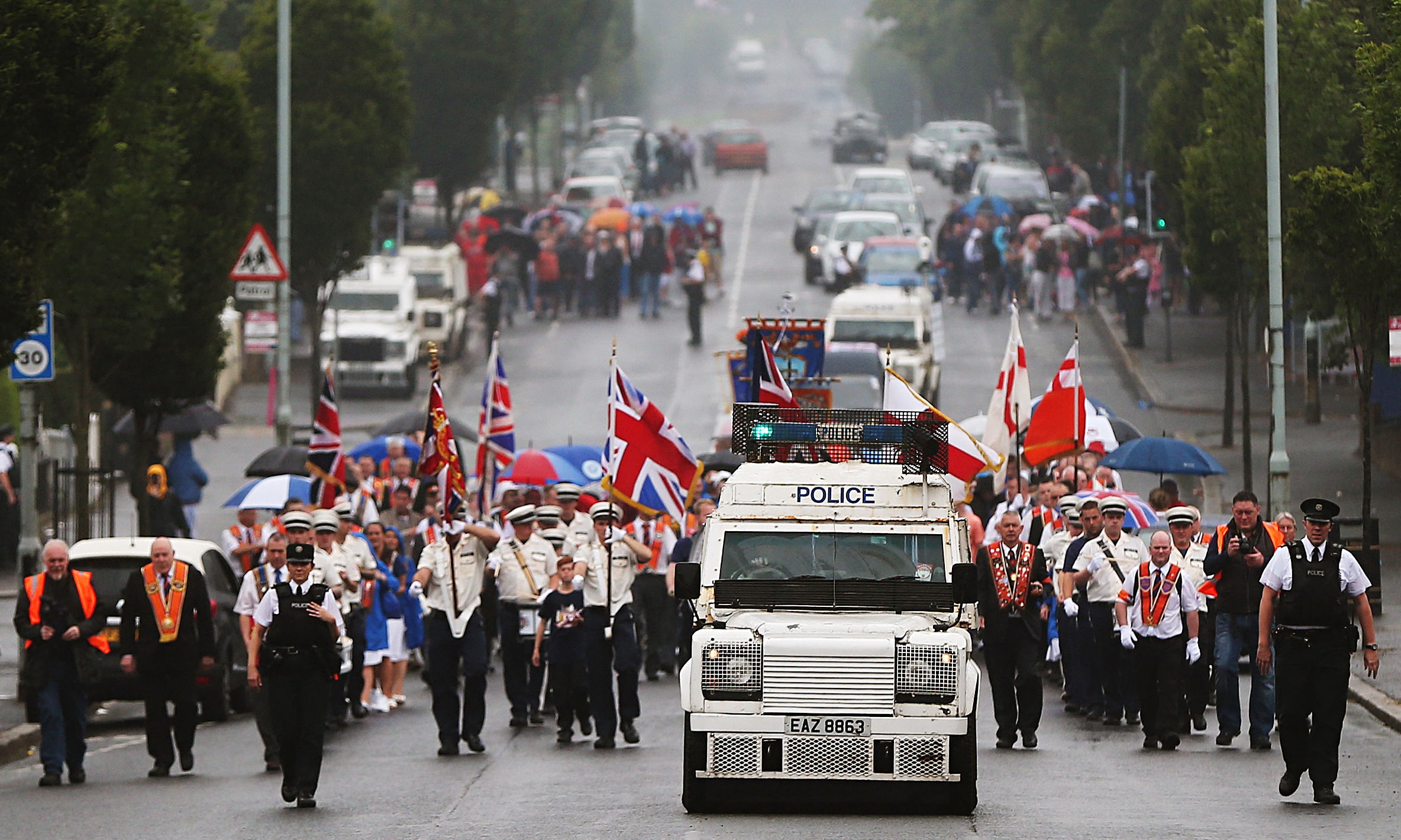 Orange Order march in Belfast begins peacefully UK news The Guardian
