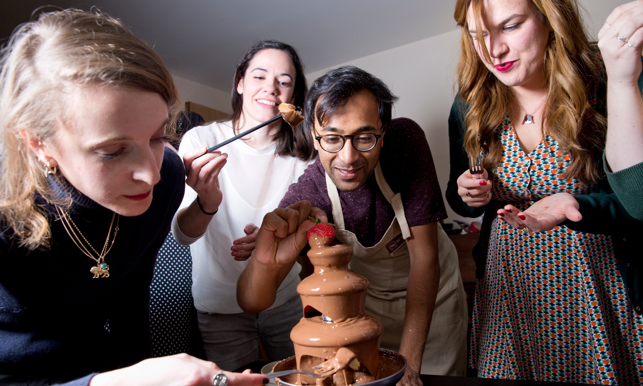 Rhik and friends tuck into the chocolate fountain