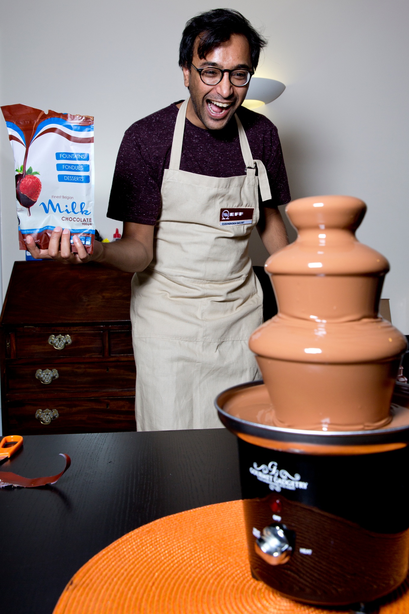 Rhik looks pretty happy with his chocolate fountain