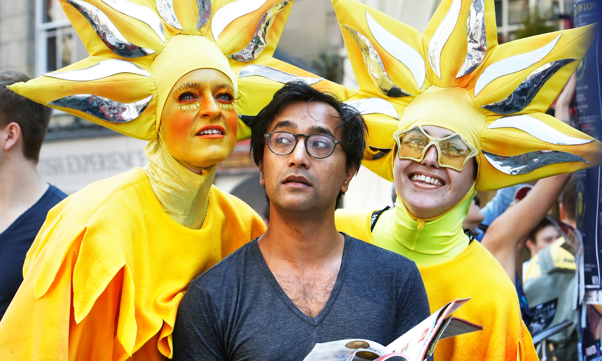 Rhik Samadder with performers on the Royal Mile. Edinburgh