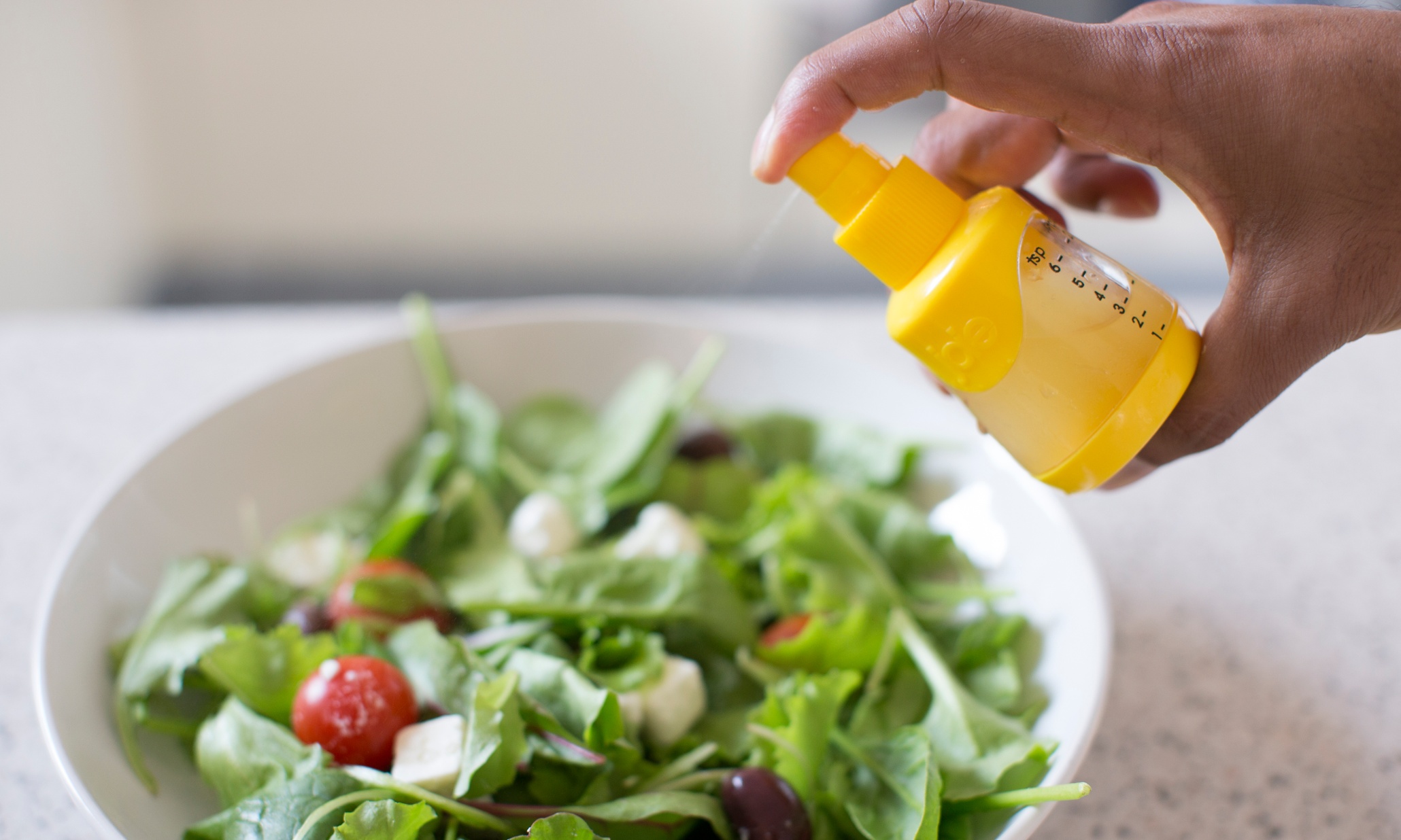 Lemon mist on Greek salad