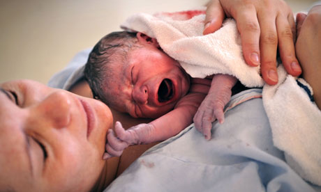 A-newborn-baby-held-by-hi-008.jpg
