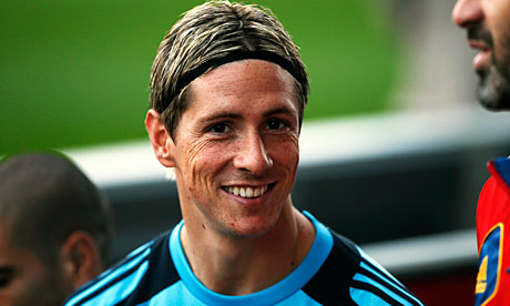 Spain and Chelsea striker Fernando Torres says he has become more of a team player on the pitch. Photograph: Juan Medina/Reuters
