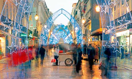 Christmas shopping on Rua Augusta, Lisbon. Photograph: Alamy